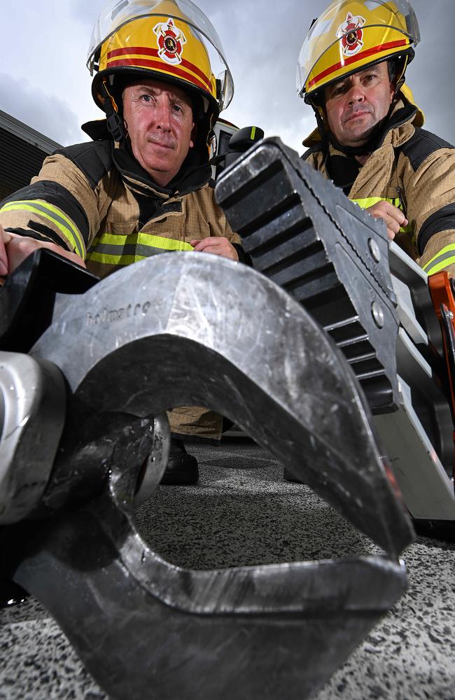 Station officers Alex Pearl and Matthew Skewes with hydraulic cutting equipment at the Annerley Fire and Rescue Station. Picture: Lyndon Mechielsen/Courier Mail