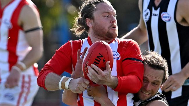 Parkside’s Joseph Jamieson tackles North Footscray’s Samuel Kater. Picture: Andy Brownbill