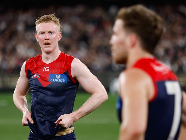 MELBOURNE, AUSTRALIA - SEPTEMBER 15: Clayton Oliver of the Demons looks dejected after a loss  during the 2023 AFL First Semi Final match between the Melbourne Demons and the Carlton Blues at Melbourne Cricket Ground on September 15, 2023 in Melbourne, Australia. (Photo by Dylan Burns/AFL Photos via Getty Images)