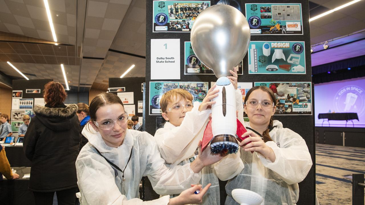 Dalby South State School students (from left) Lilly-Jade Cuzner, Vincent O'Hara and Marnii Davidson work with their hybrid high altitude design project in Kids in Space Queensland finals and showcase at Edmund Rice Cultural Centre St Mary's College, Friday, June 7, 2024. Picture: Kevin Farmer