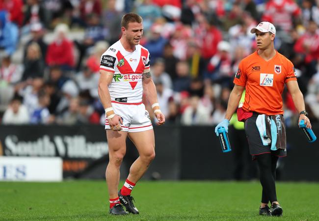 Euan Aitken leaves the field with a hamstring injury. Picture: Brett Costello