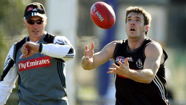 Malthouse putting Swan through his paces during training in 2006.