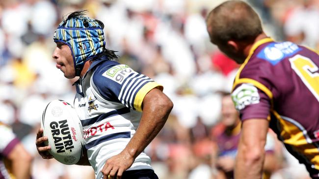 Johnathan Thurston makes a break against the Broncos in 2006.