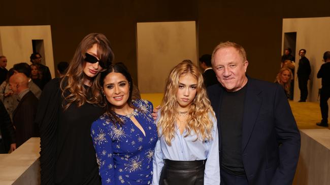 Salma Hayek with stepdaughter Mathilde (left), daughter Valentina and husband Francois Pinault attend Milan Fashion Week in February. Picture: Victor Boyko/Getty Images for Gucci