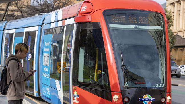 Commuters at the Victoria Square tram stop were warned to expect delays before the union called off the strike. Picture: NCA NewsWire / Kelly Barnes