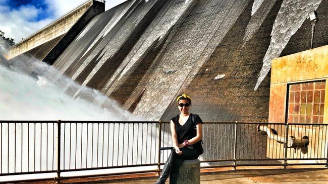 Windy weather tips water over Tinaroo Dam spillway for first time in ...