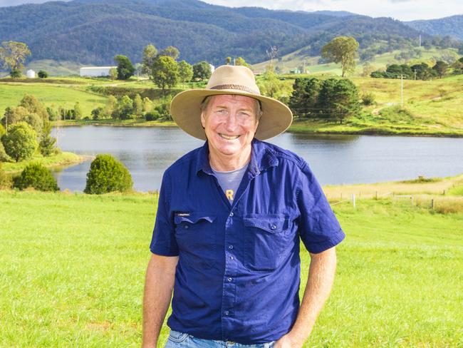 Bega Cheese executive chairman Barry Irvin on his Bega Valley dairy farm. And with his son, Andrew, and grandchildren Abs, Archie, Bella, Lex and Zach on the Bemboka dairy farm., Pictures: Robert Hayson