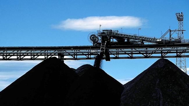 An undated handout photograph from Anglo American Plc shows coal being stockpiled at the Moura coal mine in Australia, released to the media on Monday, June 22, 2009.  Xstrata Plc, the Swiss metals company that sold shares in London seven years ago, is seeking a merger with Anglo American Plc  to create a mining group that would rival BHP Billiton Ltd., the world's largest. Source: VisMedia via Bloomberg News EDITOR'S NOTE: NO SALES. EDITORIAL USE ONLY.