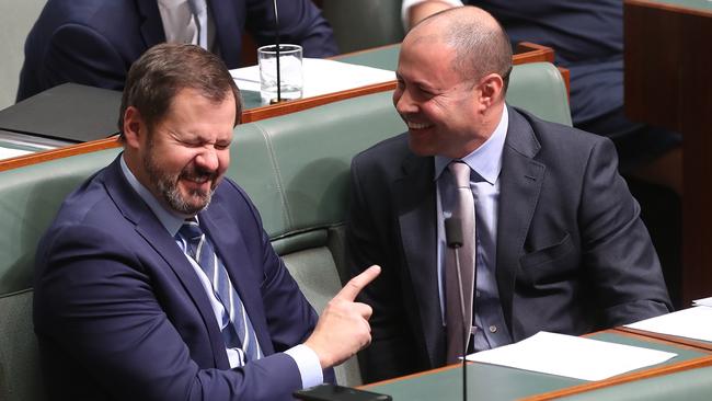 Husic with good friend, former Liberal treasurer Josh Frydenberg, in parliament. Picture: Kym Smith