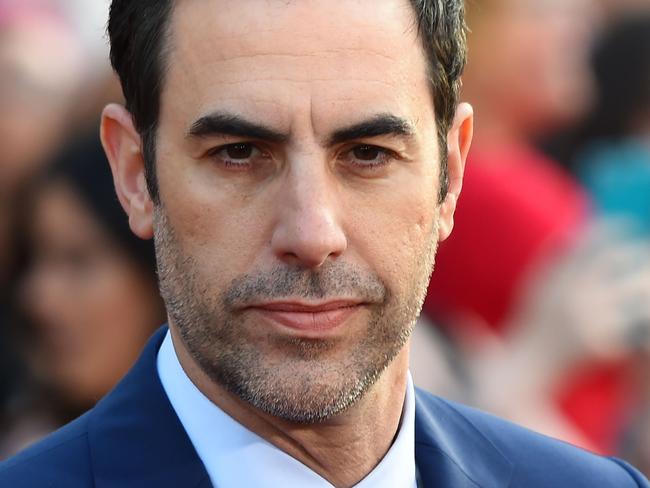 (FILES) In this file photo taken on May 23, 2016 Actor Sacha Baron Cohen attends the premiere of Disney's "Alice Through The Looking Glass," at the El Capitan Theatre in Hollywood, California. "Who is America?" is both the title of Sacha Baron Cohen's first foray into television satire in more than a decade and the existential question on the lips of liberals living through the Trump presidency. The deries debuted on Showtime on July 15, 2018. / AFP PHOTO / Robyn BECK