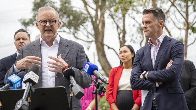 The prime minister, front-left, and NSW Premier Chris Minns, right, on Sunday.