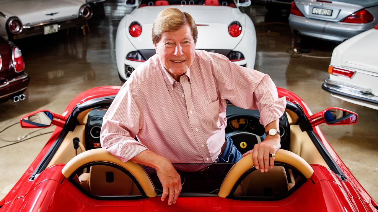 Jeremy Cordeaux sitting in his garage with his prized cars. Picture: Matt Turner (File)