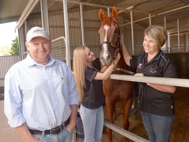 2/3/16. Morphettville local and horse trainer Peter Blanch, trains a horse called Jim's Journey. Peter's daughter Amber - 17yrs and wife Belinda are also heavily involved in the family business.Peter, Amber, Jim's Journey and Belinda at homePic: Keryn Stevens