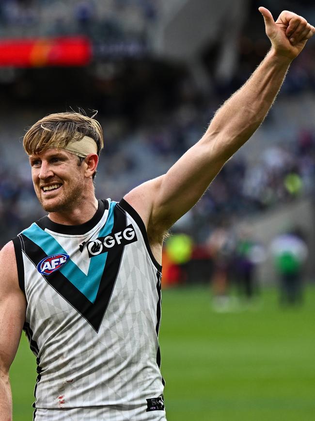 Tom Jonas celebrates a Port Adelaide win this year. Picture: Daniel Carson/AFL Photos via Getty Images