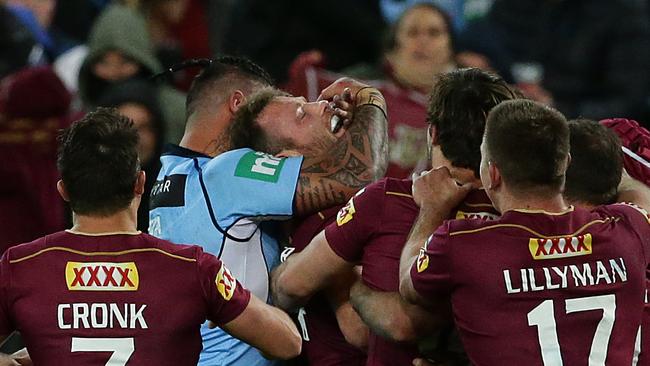 NSW Andrew Fifita rips back the head of Gavin Cooper after a try. Queensland vs. New South Wales at ANZ Stadium in Sydney for game 3 in the State of Origin series. Pic Peter Wallis