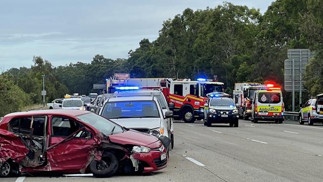 The aftermath of the multi-vehicle crash on the M1 at Coomera. Picture: QAS