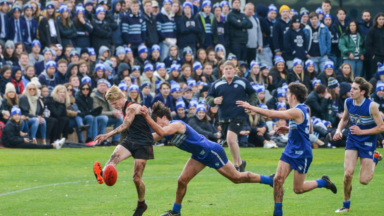 Rostrevor's Nathan McCarthy gets a kick away under pressure. Picture: AAP/Brenton Edwards