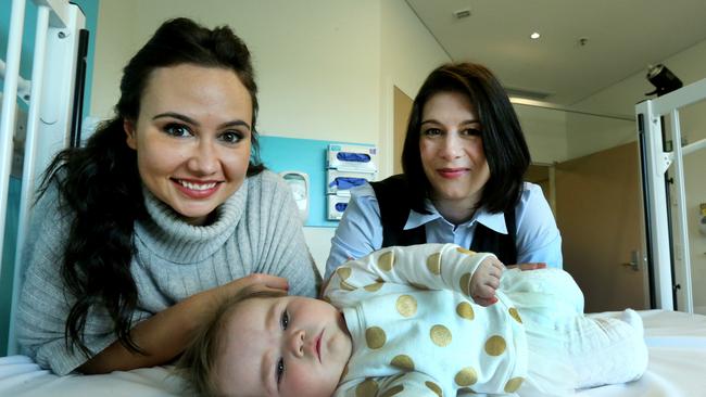 Pictured at the Gold Coast Private Hospital at Southport New Mum Leanne Fletcher and her 7 month old Baby Emelia Butcher with paediatrics Unit nurse manager Emma Gerrard. Picture Mike Batterham