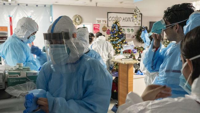Medical staff members put on PPE to prepare to go into the COVID-19 intensive care unit in Houston. Picture: Getty Images