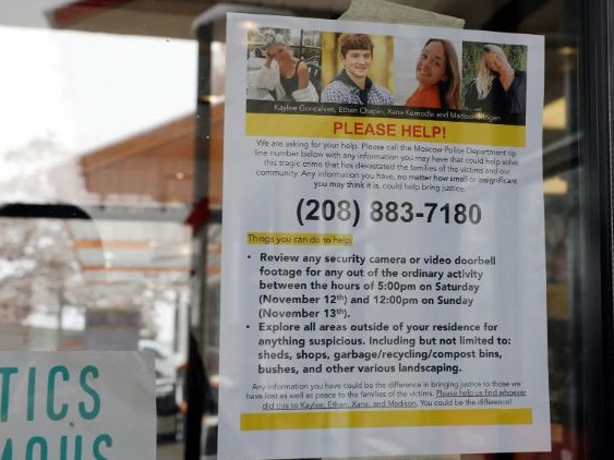 A flyer posted at a local business asking for help to find the person who killed the four students. Picture: Kevin C. Downs/New York Post