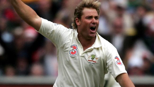 Shane Warne celebrates after taking his 700th Test wicket: Picture: Stuart Mcevoy