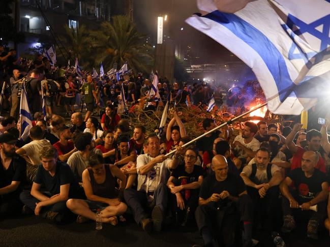 Protesters block Tel Aviv's Ayalon highway during an anti-government protest calling for the release of Israelis held hostage by Palestinian militants in Gaza. Picture: AFP