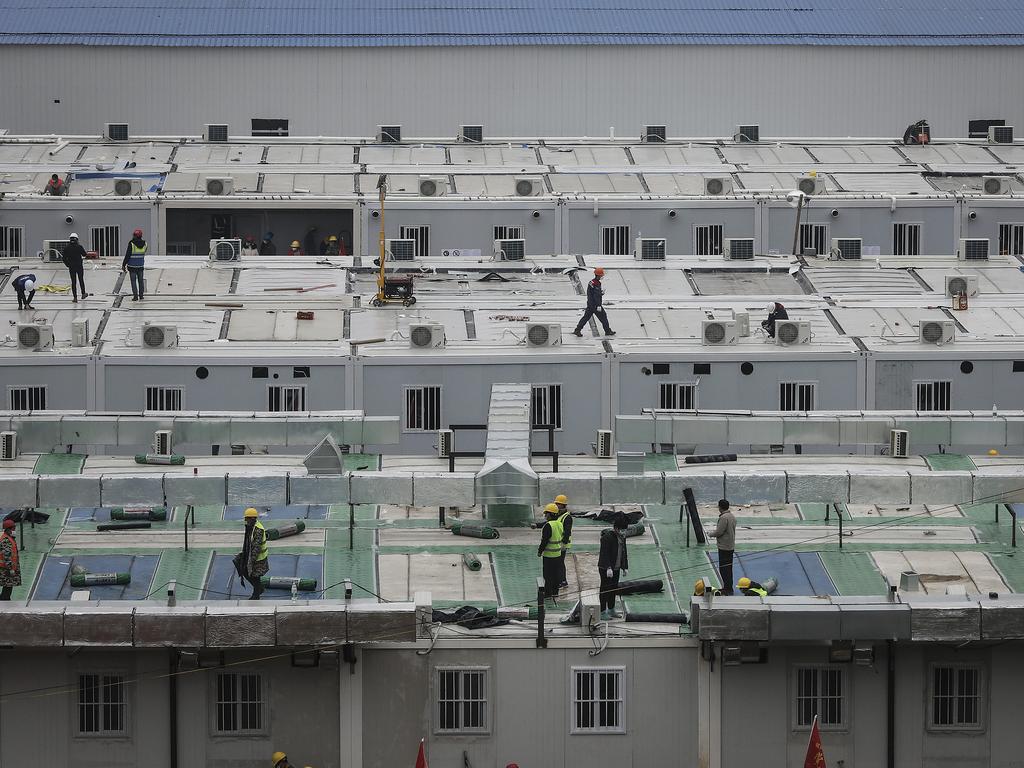 Workers continue to build Wuhan Huoshenshan Hospital in response to the coronavirus outbreak and with the capacity of 1000 beds. Picture: Getty Images