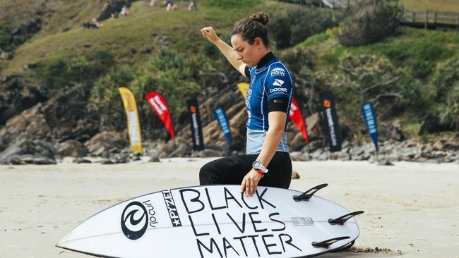 Tyler Wright takes a knee before entering tyhe water at the Tweed Coast Pro. Picture: WSL/ Matt Dubar