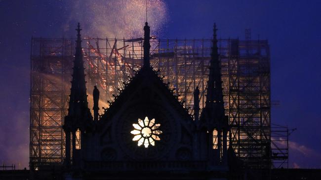 Smoke rises at Notre-Dame Cathedral in central Paris.