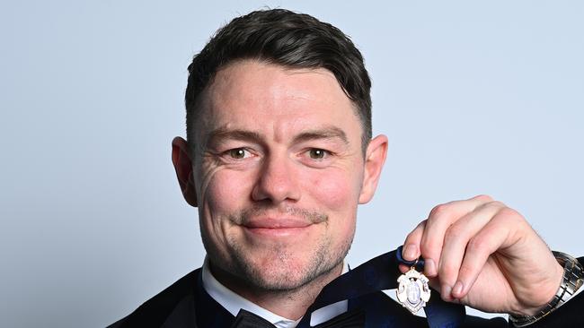 BRISBANE, AUSTRALIA - SEPTEMBER 25: Lachie Neale of the Lions poses for portraits with the Brownlow Medal during the 2023 Brownlow Medal at The Gabba on September 25, 2023 in Brisbane, Australia. (Photo by Albert Perez/AFL Photos via Getty Images)