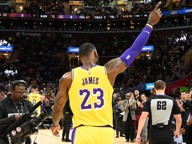 CLEVELAND, OH - NOVEMBER 21: LeBron James #23 of the Los Angeles Lakers recognizes the fans after the Cleveland Cavaliers honored James during a time-out during the first half at Quicken Loans Arena on November 21, 2018 in Cleveland, Ohio. NOTE TO USER: User expressly acknowledges and agrees that, by downloading and/or using this photograph, user is consenting to the terms and conditions of the Getty Images License Agreement.   Jason Miller/Getty Images/AFP == FOR NEWSPAPERS, INTERNET, TELCOS & TELEVISION USE ONLY ==