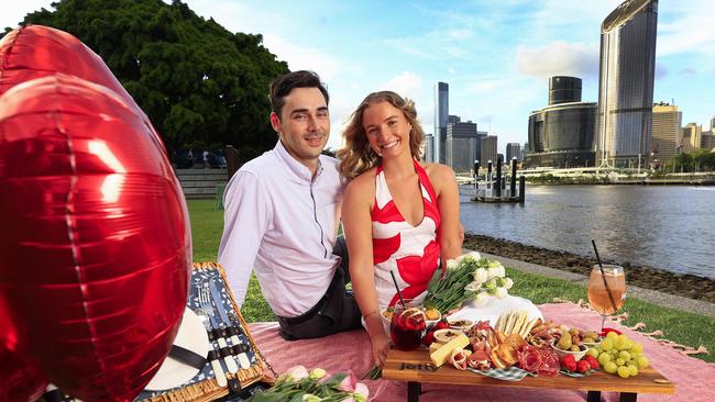 Jack Law and Sophie Radunz snuggle up for Valentines Day on the Green at Southbank. Pics Adam Head