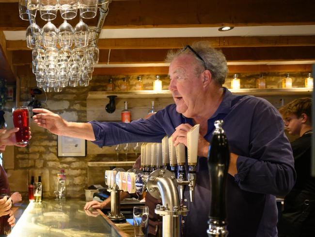 Jeremy Clarkson pouring drinks at his newly opened pub. Picture: The Farmers Dog