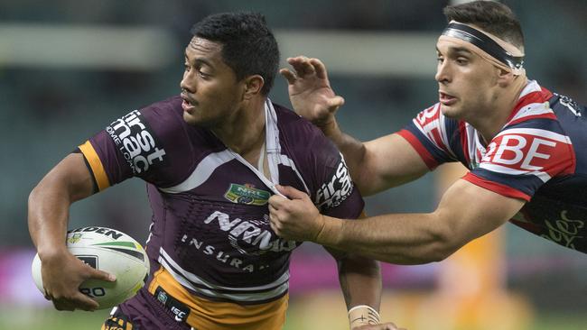 Ryan Matterson tackles Anthony Milford.