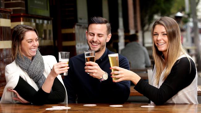 Katrina Davidson, Pete Richardson and Ashleigh Wood enjoy a beer at The Glenmore Hotel at The Rocks. Picture: Gregg Porteous