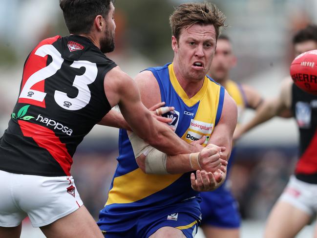 VFL Finals. Williamstown vs Essendon at Port Melbourne. 15/09/2019.   Williamstowns Nick Meese clears by hand    . Pic: Michael Klein.