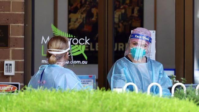 Public health officials at Menarock Life aged care facility in Werribee. Picture: Aaron Francis.