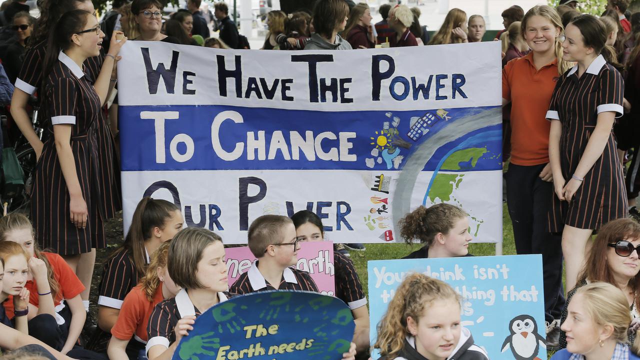 Primary and high school students in Tasmania walked out of school to protest inaction on climate change. Students protesting on parliament lawns, Hobart. Picture: Mathew Farrell