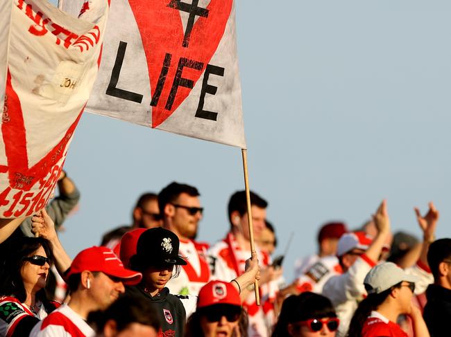 SYDNEY, AUSTRALIA - AUGUST 04: Dragons fans show their support during the round 20 NRL match between the St George Illawarra Dragons and the Parramatta Eels at WIN Jubilee Stadium on August 04, 2019 in Sydney, Australia. (Photo by Mark Kolbe/Getty Images)