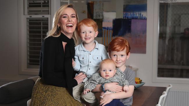 Newsreader Alicia Loxley and her three children Archie, 5, Ned, 3, and Ada, 3 months. Picture: Alex Coppel.