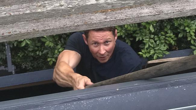 On Wednesday, May 2, 2018, a Kirribilli woman says she caught her neighbour Phillip Manwarring filming her while she was half-dressed in her apartment through her balcony.