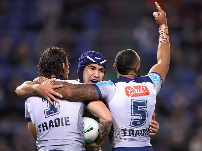 (L-R) Nicho Hynes, Jahrome Hughes and Josh Addo-Carr celebrate scoring a try. Picture: Ashley Feder/Getty Images