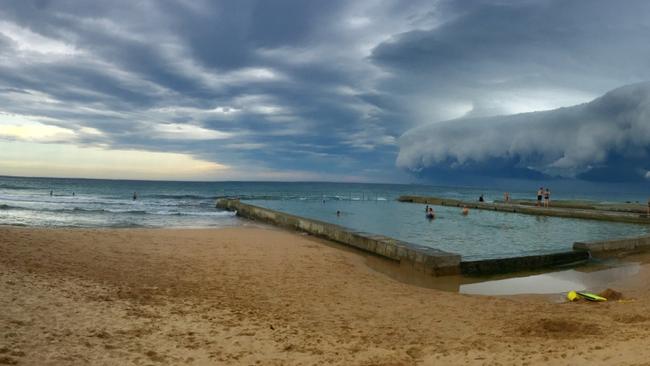 The calm before the downpour at Austinmer Beach. Picture: Zoe Taylor