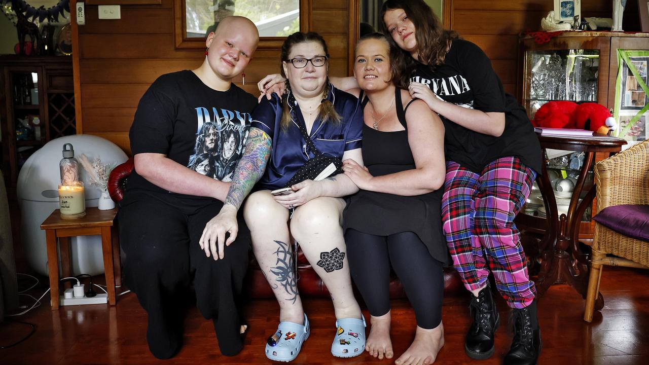 Kay Henderson, second from left, pictured with her niece Necole Macey, third from left, and great nieces Hanne Macey (left) and Kendra Macey (right) 15 minutes before she passed away using the Voluntary Assisted Dying (VAD) program. This is the last photo of Kay, her last cuddle on the couch before moving to her bedroom surrounded by family and friends to pass away. Picture: Sam Ruttyn