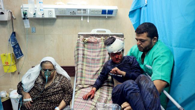 A nurse moves an injured Palestinian boy in the Al-Aqsa Hospital following the Israeli bombardment of in Deir el-Balah. Picture: Bashar Taleb