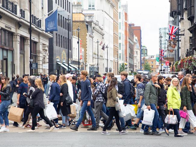 England London Oxford street pedestrians crossing street