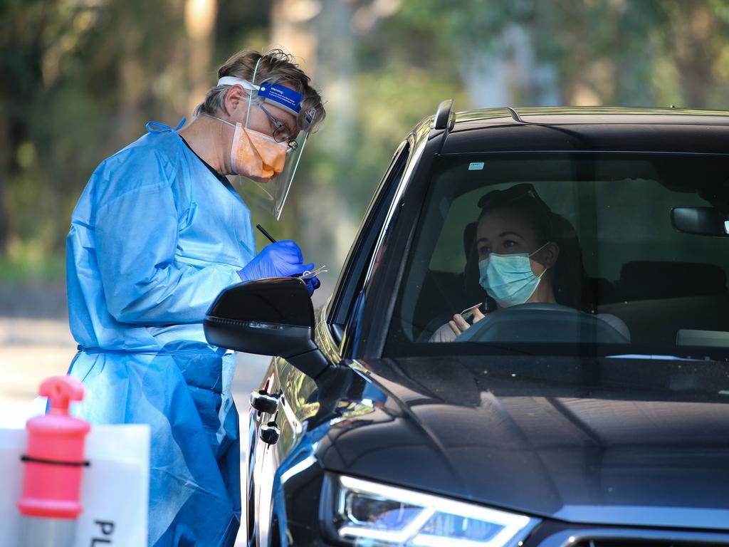 Nurses are seen working at the Covid-19 testing drive through clinic in Willoughby, Sydney. Picture: NCA NewsWire/Gaye Gerard