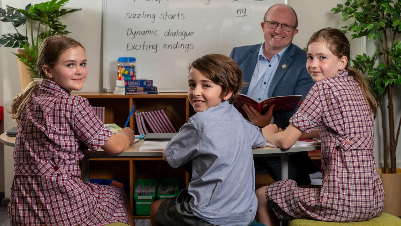 Pilgrim School Year 5 students Lana, Josiah and Ella with school principal Andrew Edmondson. Picture: Naomi Jellicoe