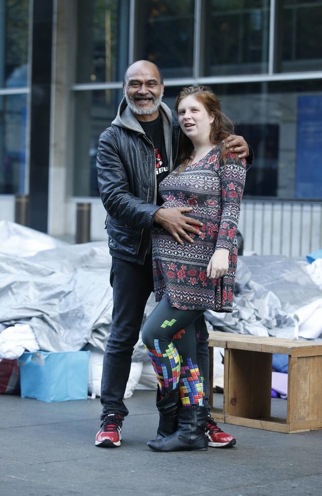 Lanz Priestley and his pregnant partner Nina Wilson in Martin Place. Pictures: Stephen Cooper