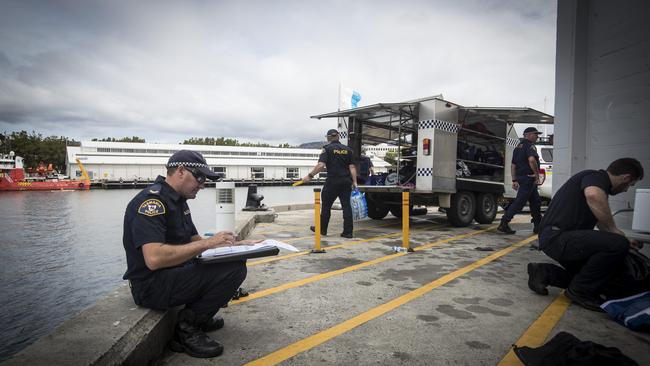 Marine Police packing up. Picture: LUKE BOWDEN